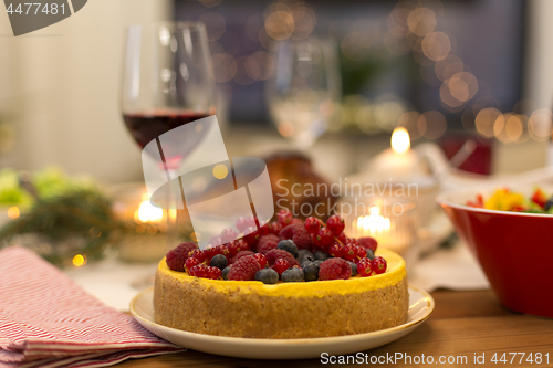 Image of cake and other food on christmas table at home