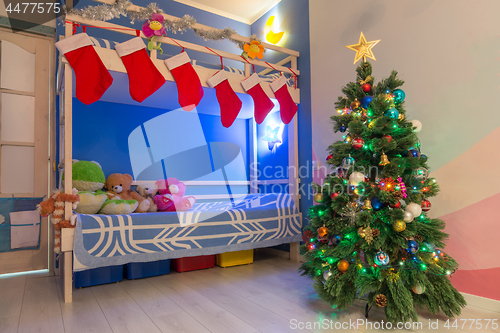 Image of The interior of the children\'s room decorated in the New Year\'s style