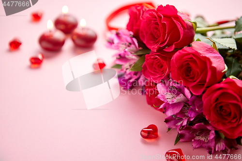 Image of Mixed flowers bouquet with roses, candles and heart shaped acrylic decorations