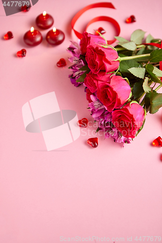 Image of Mixed flowers bouquet with roses, candles and heart shaped acryl