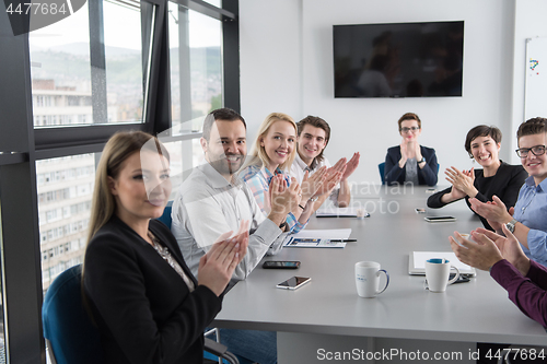 Image of Group of young people meeting in startup office