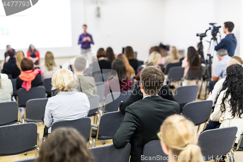 Image of Media interview and round table discussion at popular scientific conference.