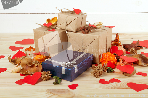 Image of Gift boxes on wooden table