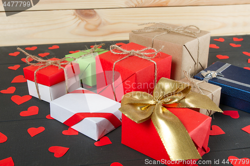 Image of Gift boxes on wooden table