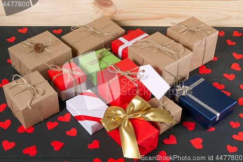 Image of Gift boxes on wooden table