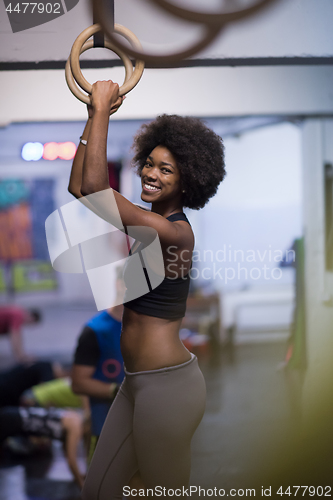 Image of black woman doing dipping exercise