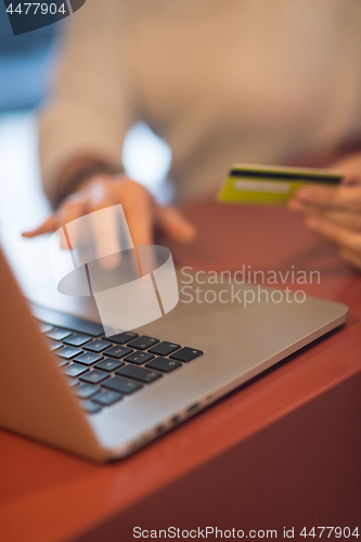 Image of woman  shopping  Online