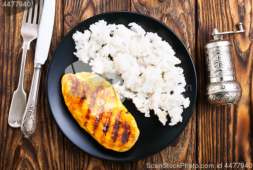 Image of boiled rice with fried chicken breast