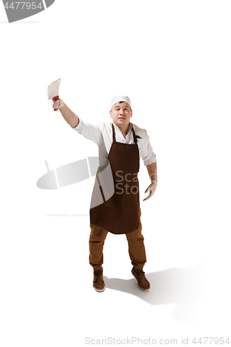 Image of Smiling butcher jumping with a cleaver isolated on white background