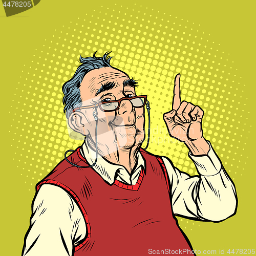 Image of smile elderly man with glasses attention gesture index finger up