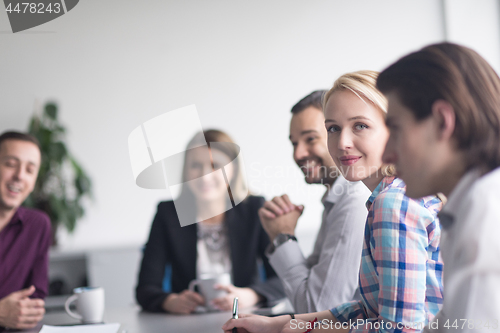 Image of Group of young people meeting in startup office