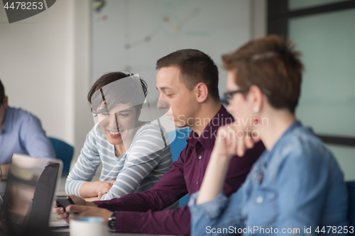 Image of Group of young people meeting in startup office