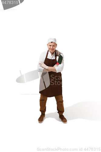 Image of Smiling butcher posing with a cleaver isolated on white background