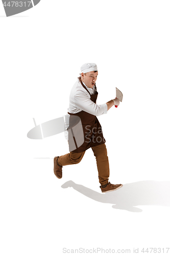Image of Serious butcher running with a cleaver isolated on white background