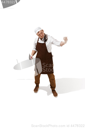 Image of Angry aggressive butcher posing with a cleaver isolated on white background