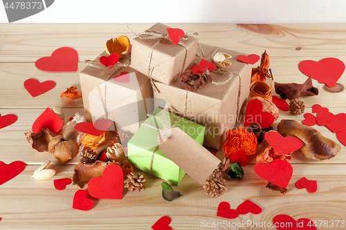 Image of Gift boxes on wooden table