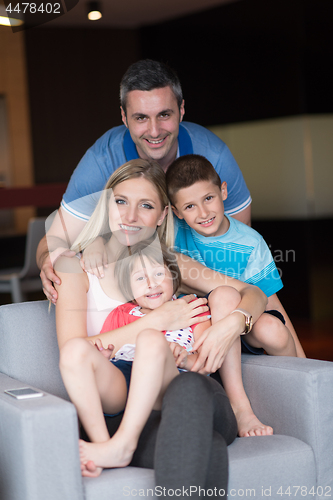 Image of couple spending time with kids