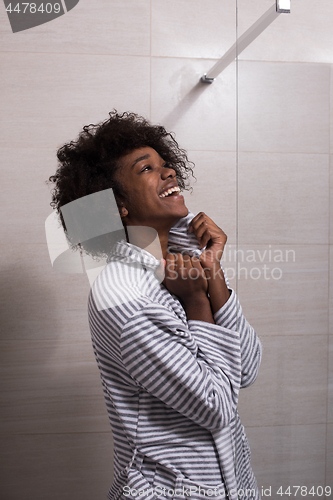 Image of beautiful black woman wearing  bathrobe