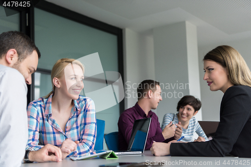 Image of Business Team At A Meeting at modern office building