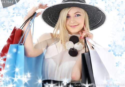 Image of portrait of blonde in hat with shopping bags