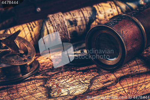 Image of Old vintage compass on ancient map