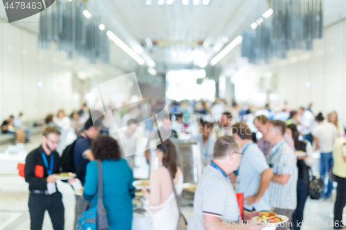 Image of Blured image of businesspeople at coffee break at conference meeting.