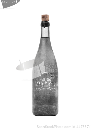 Image of Old bottle with poison inside, covered in dust