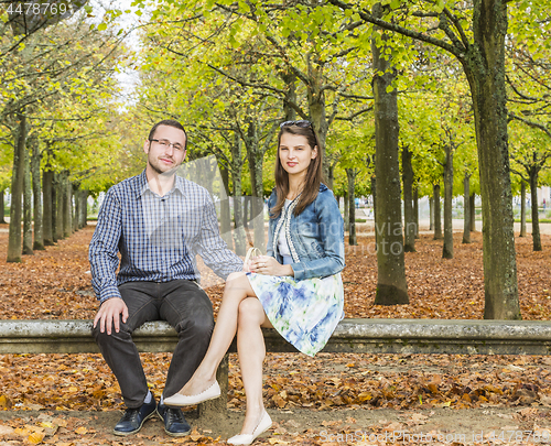 Image of Couple in a Park in Autumn