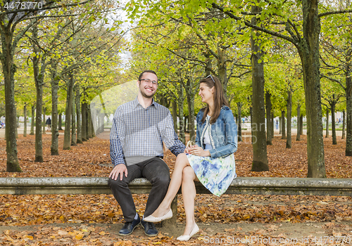 Image of Happy Couple in a Park in Autumn