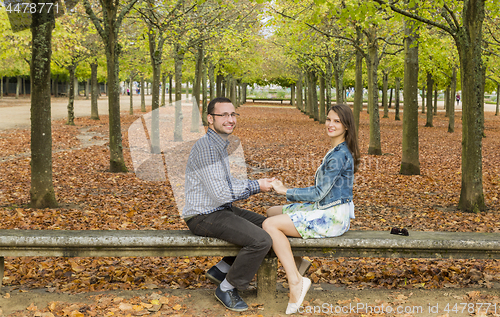 Image of Happy Couple in a Park in Autumn