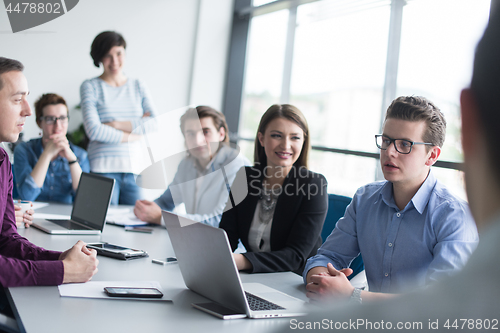 Image of Business Team At A Meeting at modern office building