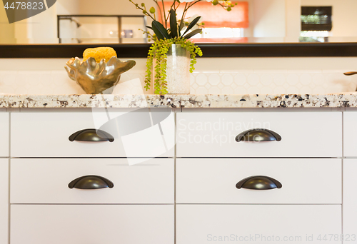 Image of Classic Bathroom Granite Counter Top and Drawers Abstract