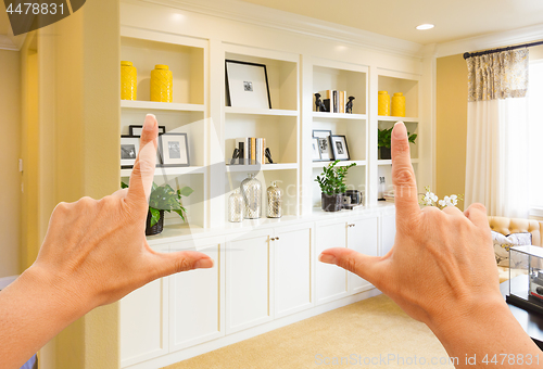 Image of Hands Framing Custom Built-in Shelves and Cabinets Wall Design I