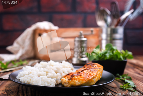 Image of boiled rice with fried chicken breast