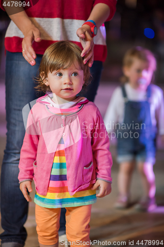 Image of little girl dancing in the kids disco