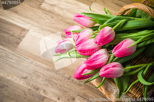 Image of Beautiful bouquet from pink tulips  on a table