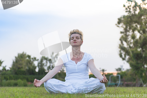 Image of woman doing yoga exercise