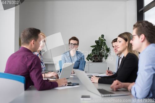 Image of Business Team At A Meeting at modern office building