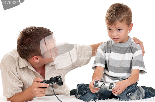 Image of Dad and son playing with Joystick