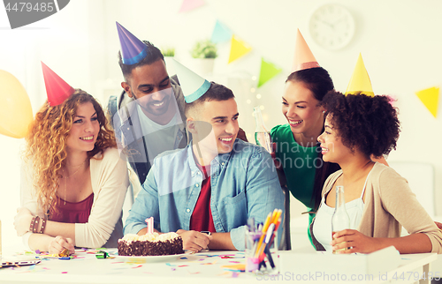 Image of corporate team celebrating one year anniversary