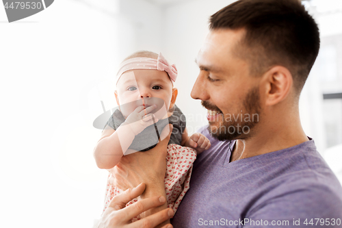 Image of close up of father little baby girl at home