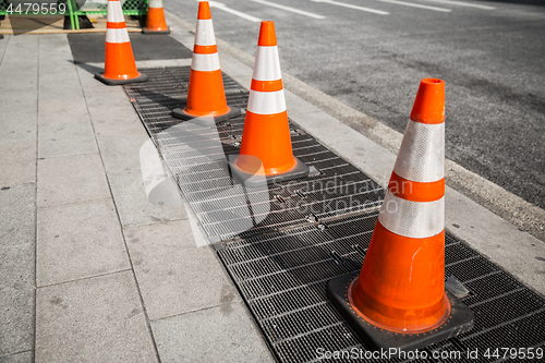 Image of close up of traffic or road cones on city street