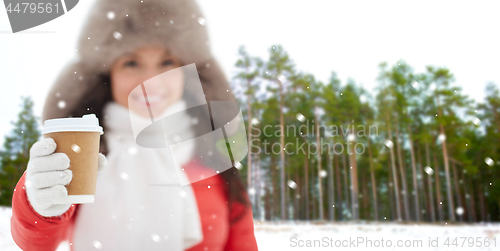 Image of close up of woman with coffee cup in winter