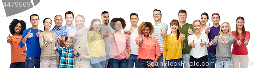 Image of group of smiling people showing thumbs up