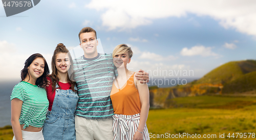 Image of happy friends hugging over white background