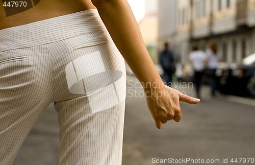 Image of hitchhiking girl