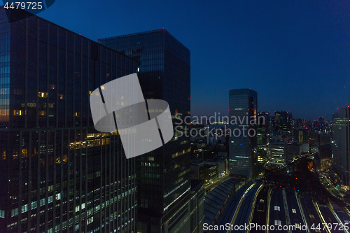 Image of view to night railway station in tokyo city, japan