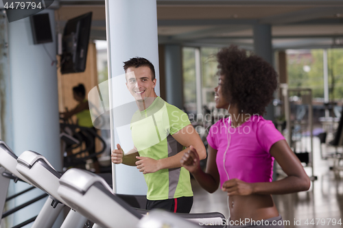 Image of people exercisinng a cardio on treadmill