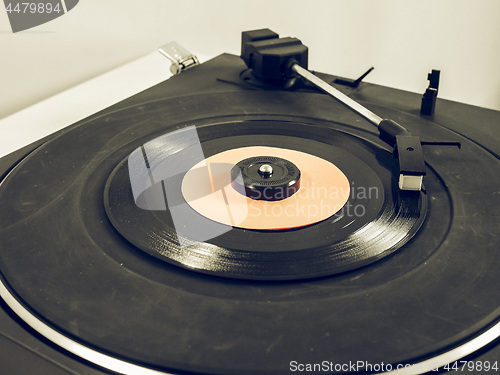 Image of Vintage looking Vinyl record on turntable