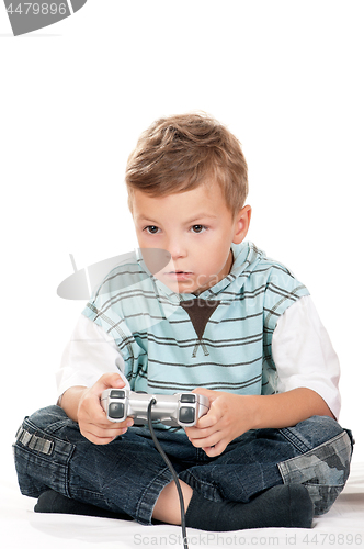 Image of Boy playing with Joystick